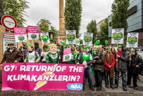 Berlin, June 2015. People demostrating against Merkel and climate changes. Berlin is the capital of Germany, and one of the 16 states of Germany. With a population of 3.5 million people, Berlin is Germany's largest city. It is the second most populous city  and the seventh most populous urban area in the European Union