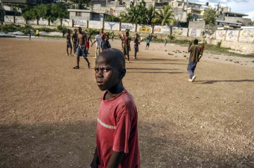 Jul 2004 Port au Prince: during a footbol mach in a suburb 
Lorenzo Moscia/GraziaNeri