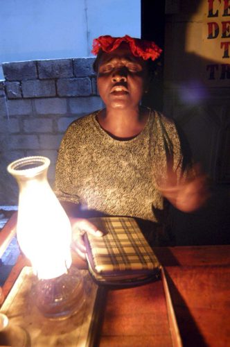 Jul 2004, Port au Prince: woman prayng in a pethacost church
Lorenzo Moscia/GraziaNeri