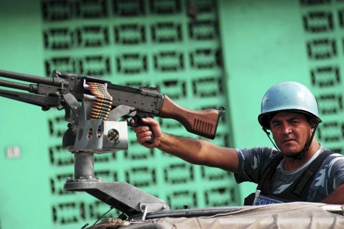 Jan 2005, Port au Prince: Jordan soldier belonging to the U.N.mission patrolling
Lorenzo Moscia/GraziaNeri
