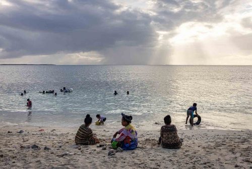 Ebeye, Marshalls Islands, July 2023 The main income for Ebeye residents is from the relatively small number of people employed on the Kwajalein military base. The money earned supports the population of around 15,000 on 80 acres (32 hectacres) of land. Over 50% of the population is estimated to be under the age of 18, and Ebeye is one of the most densely populated places in the world.