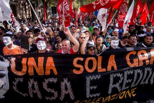 Rome Italy oct 2013. Protest against unemployment, government cuts and construction projects they say take money away from social services.
Organizers estimated that 70,000 people took part in the protest, while authorities placed the number closer to 50,000.