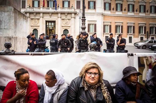 Rome, Italy, may 2014. Protesters in front of the Italian Parliament. At the base of the protest the rule that it is not possible to connect electricity and gas for those illegally occupying a house.