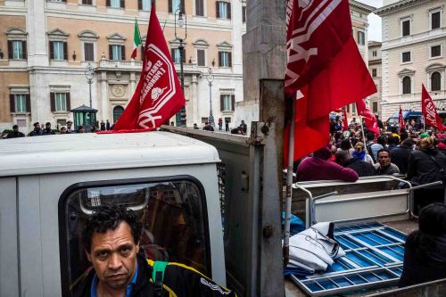 Rome, Italy, may 2014. Protesters in front of the Italian Parliament. At the base of the protest the rule that it is not possible to connect electricity and gas for those illegally occupying a house.