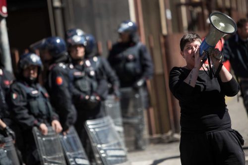 Rome, Italy, 16/4/2014.350 families are locked on the roof of an occupied building.Riot police get ready to drag away some 350 squatter families from abandoned offices in Rome