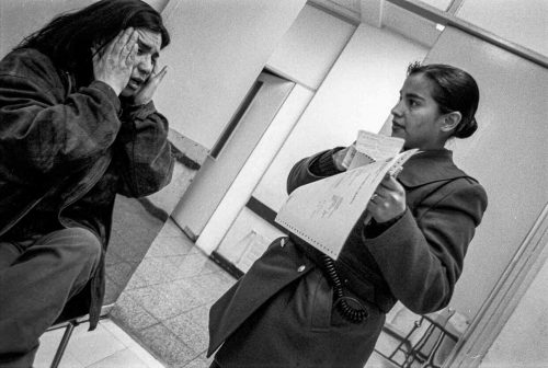 Santiago de Chile, 2003-2006: Police station, a woman that has been beaten up by her husban  giving a statement